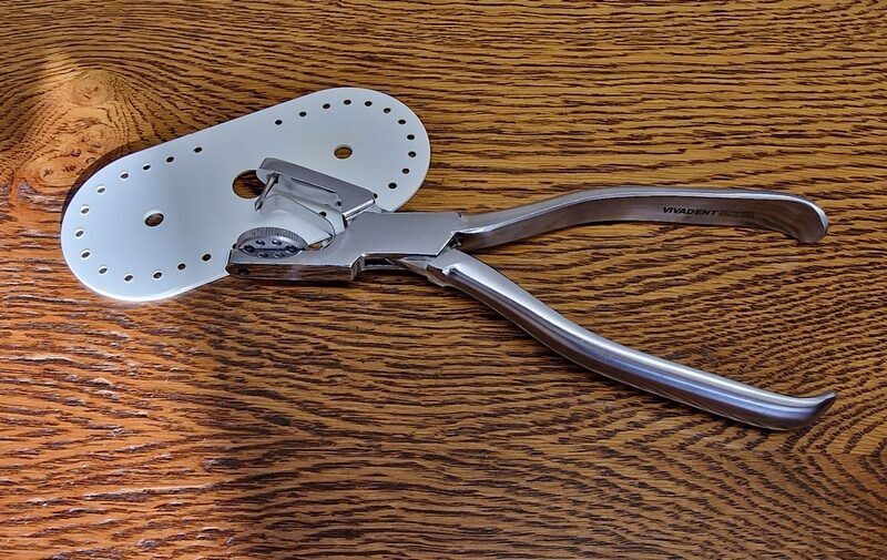 Unbenutzte Kofferdam-Lochzange | 337629